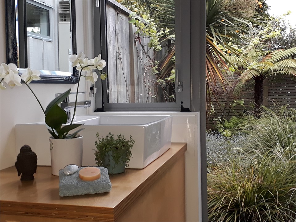 bathroom vanity looking out onto the garden