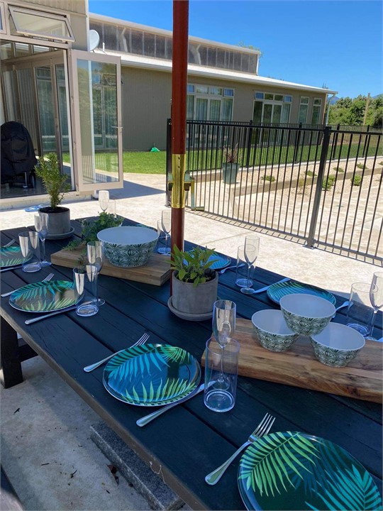 Outdoor dining by the pool