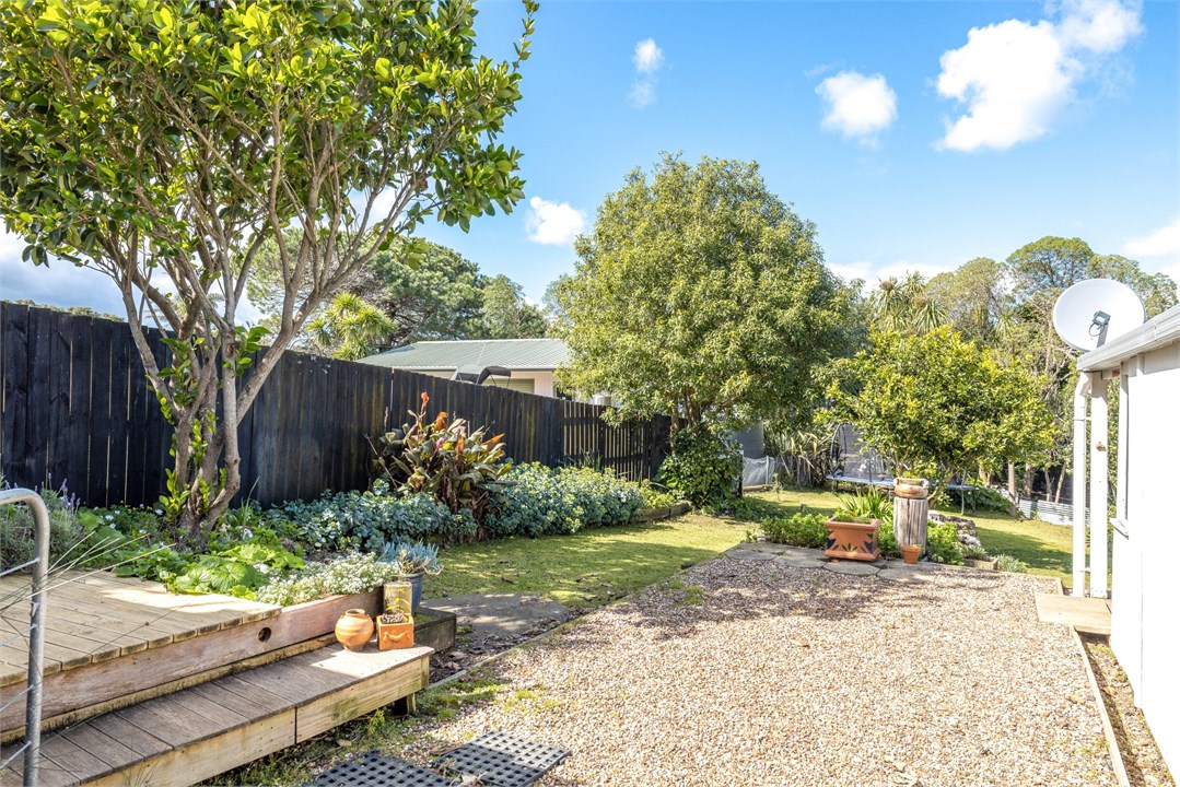 front door to right, steps to bathroom to left