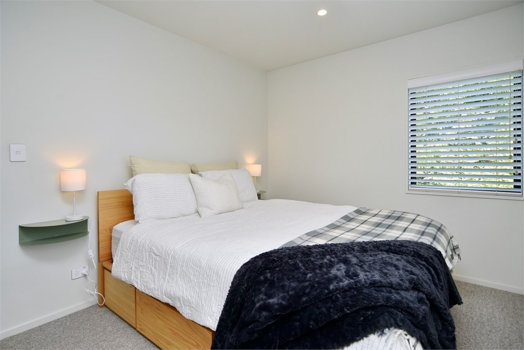 Bedroom 1 has a Queen bed