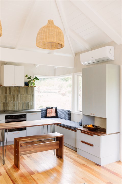 Open plan kitchen living area in cottage