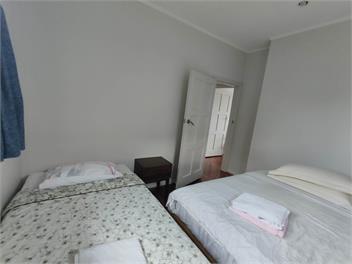 7 Beds including 4 Double Beds, 1 Single Bed, 2 Double Sofa Beds House A -