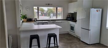 Village Bach with Large Covered Deck -