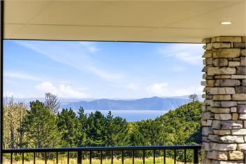 Apartment with lake, mountain & rural views. -