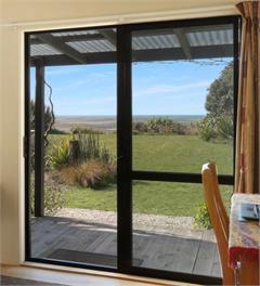 Tui and Tide ~ Beachfront ~ Where Birds, Garden & Ocean Meet~Peacefully Relaxing - Pakawau