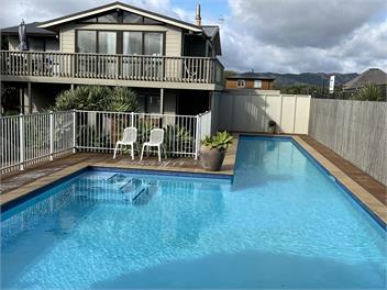 Spa + pool + tennis court + beach: The Tennis Pavilion @ Longshore has it all!   - Waikanae Beach